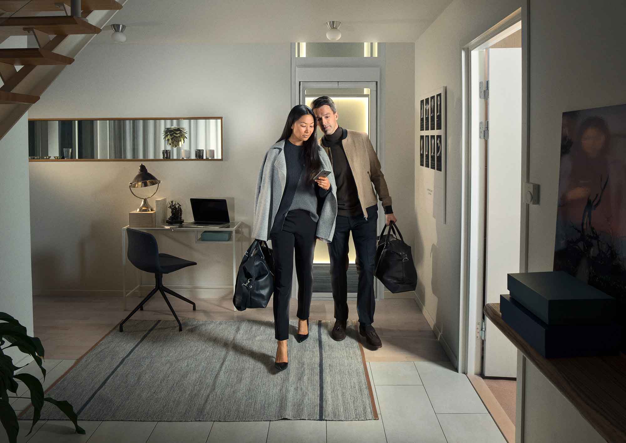 A couple infront of a homelift