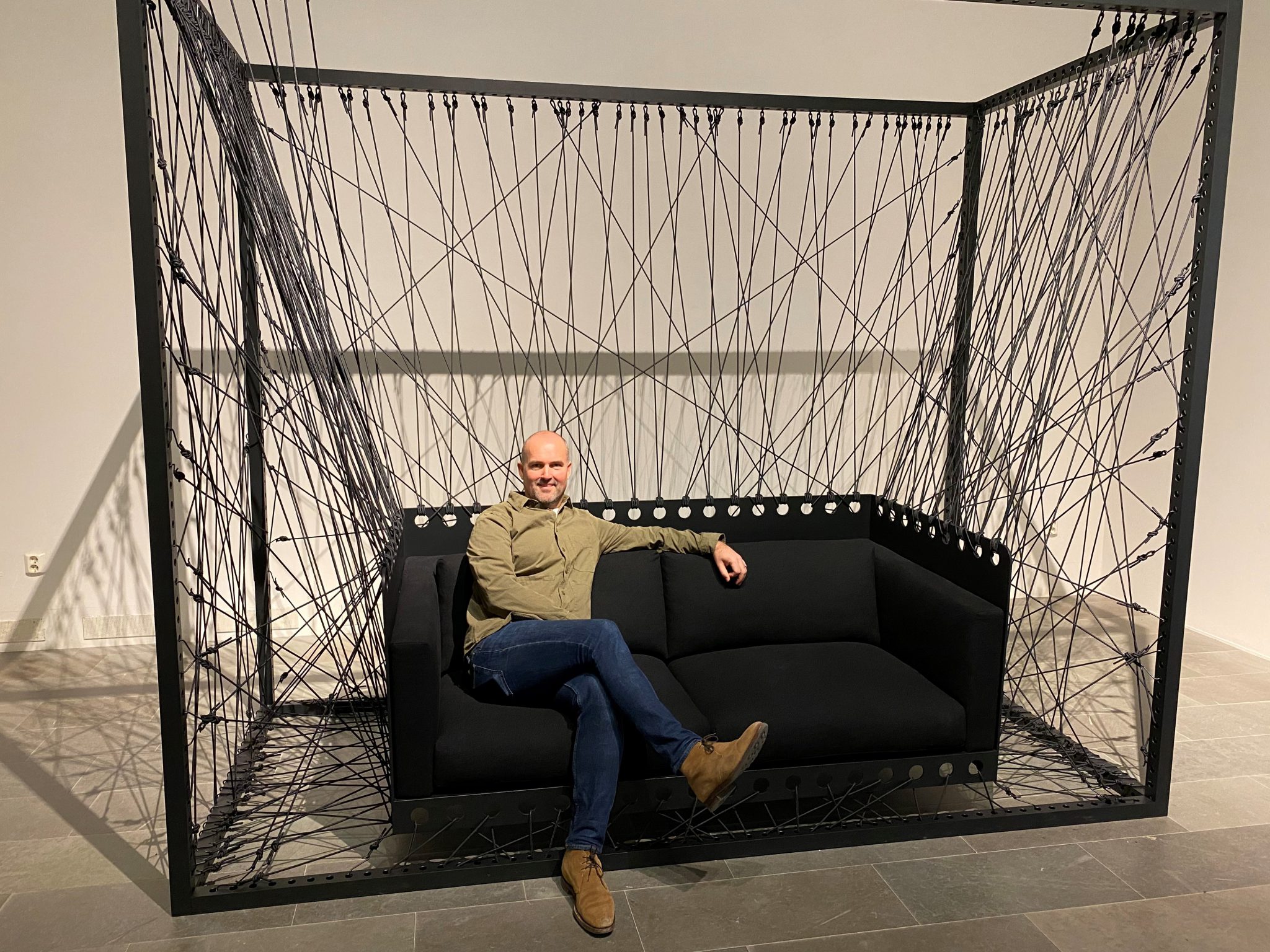 Designer Alexander Lervik in a couch