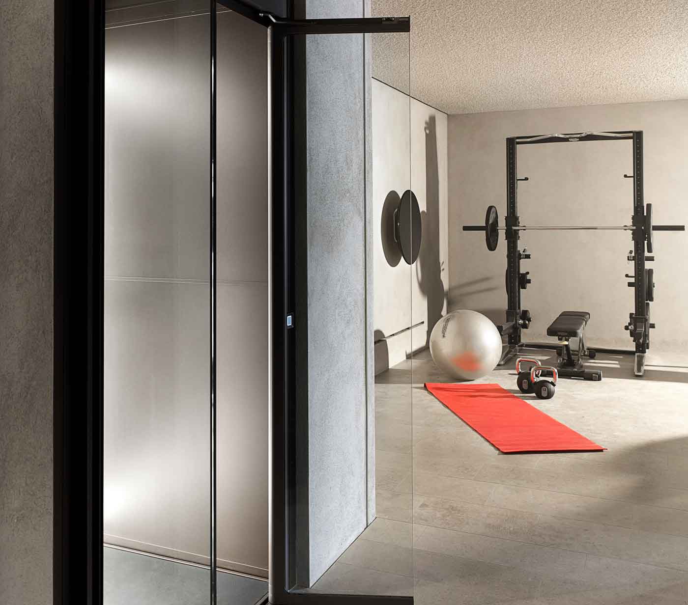 A lift infront with view over a home gym