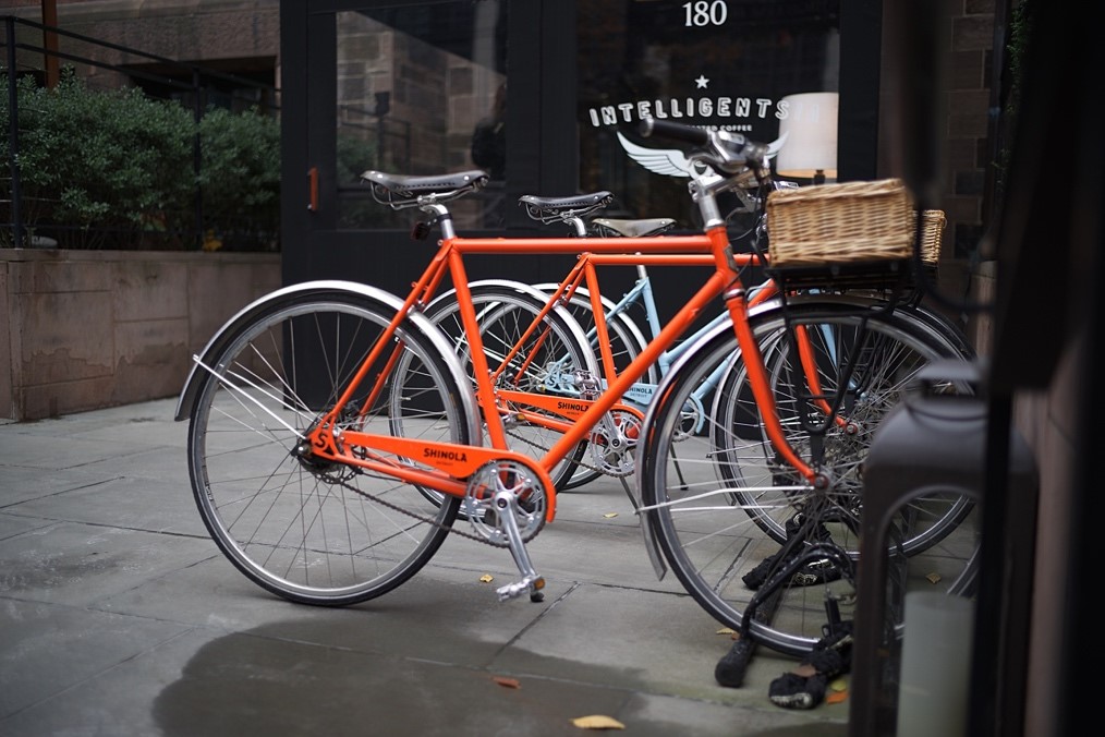  Two red orange bicycles