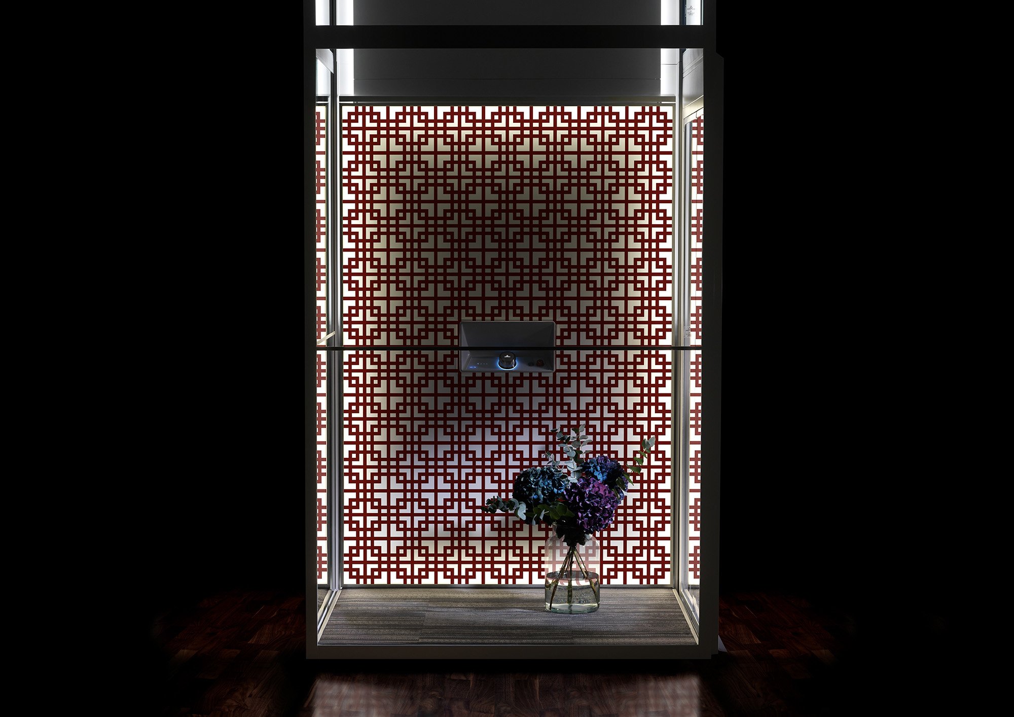 Aritco home lift with a DesignWall in orientalic