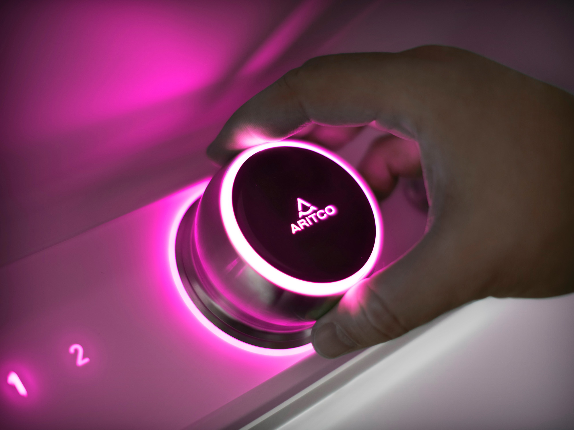 Aritco Smart Control for the home lift, lighting up in pink