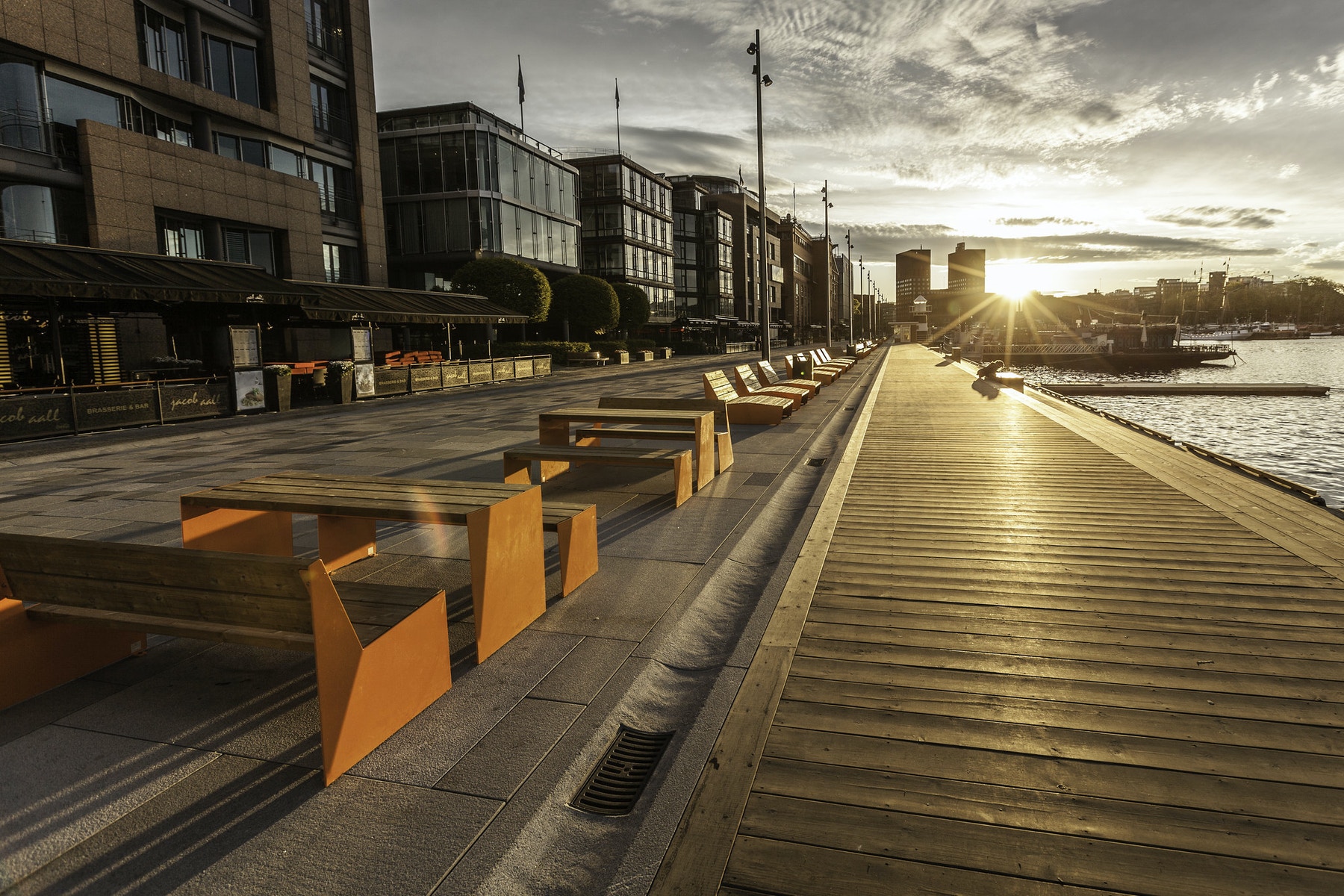 View of a walking path with benches from Vestre (Norwegian company)