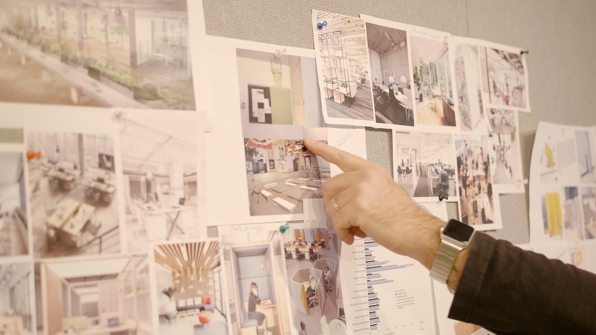 Alexander Lervik pointing at sketches