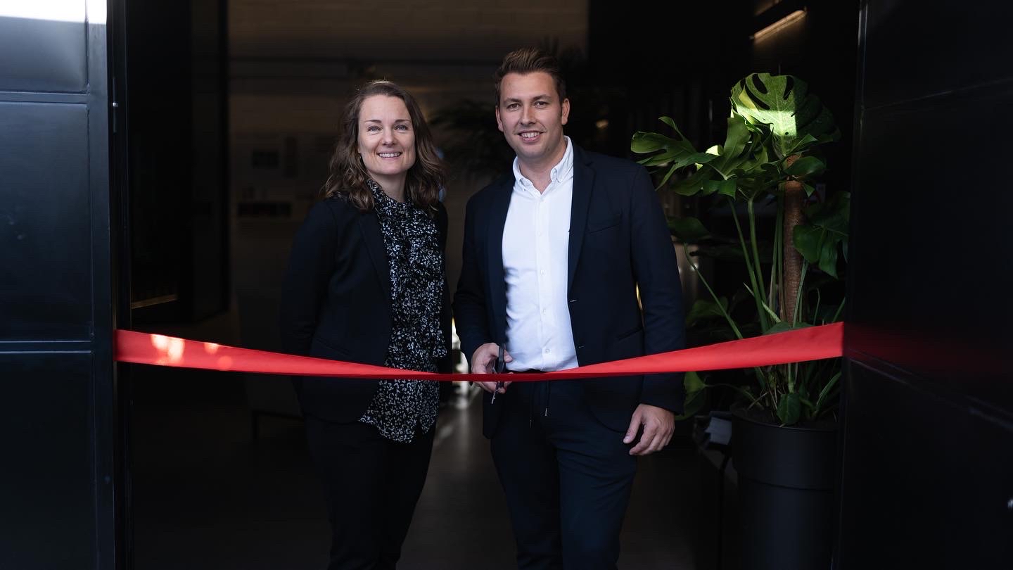 Cutting the red ribbon at opening of Aritco Showroom Spain
