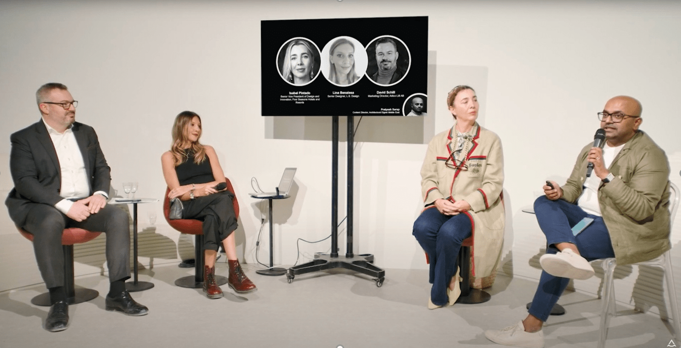 A panel discussion with two men and two woman