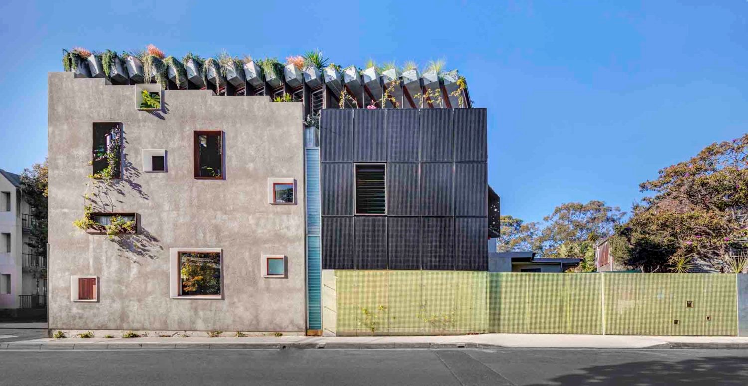 Grey house with flower