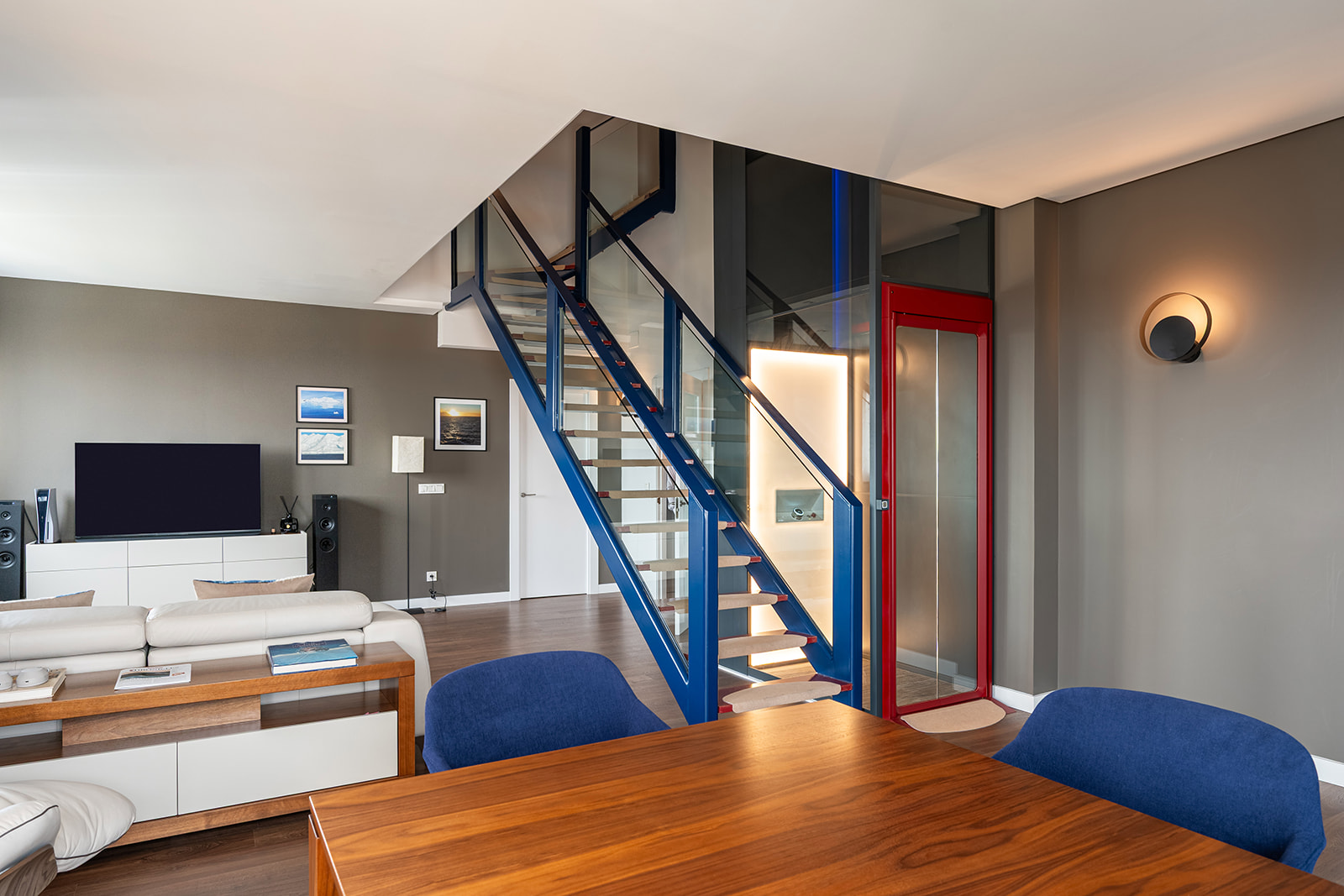 home lift in red installed in penthouse